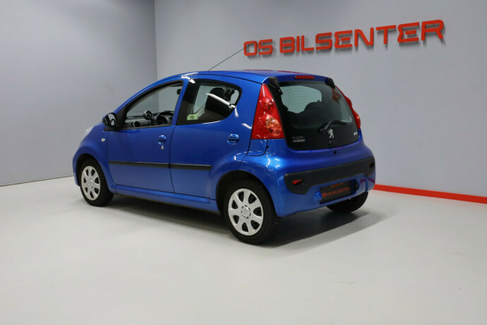 peugeot-107-bensin-2011-big-4