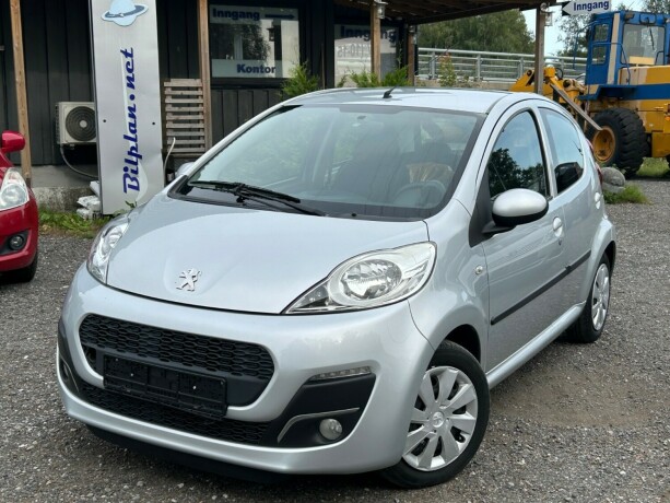 peugeot-107-bensin-2013-big-0