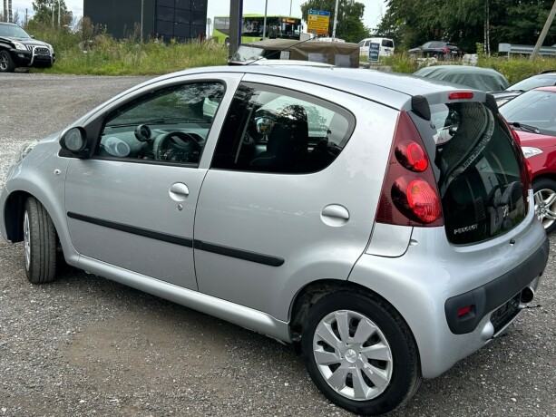 peugeot-107-bensin-2013-big-1