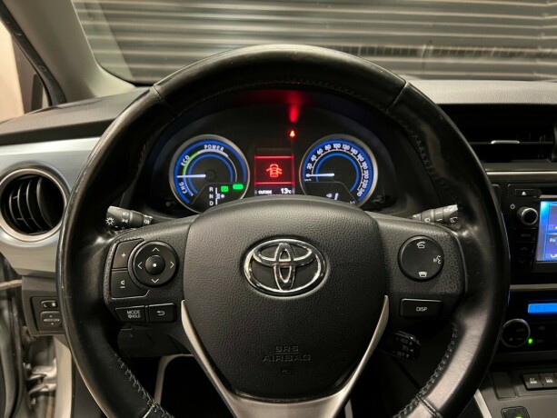 toyota-auris-elektrisitetbensin-2013-big-14