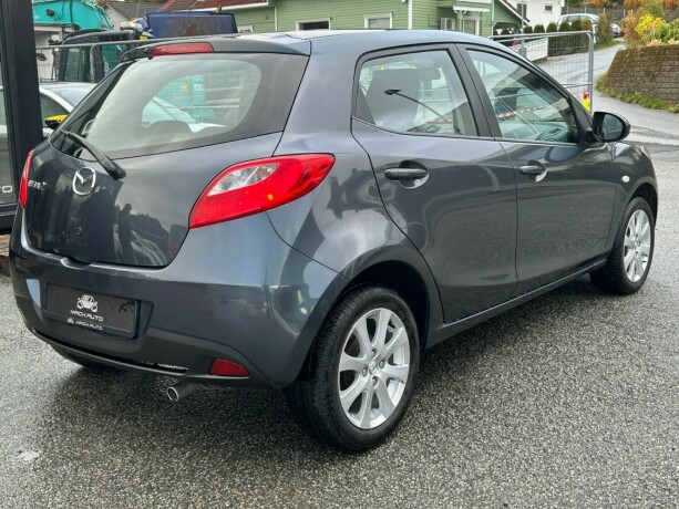 mazda-2-bensin-2012-big-4