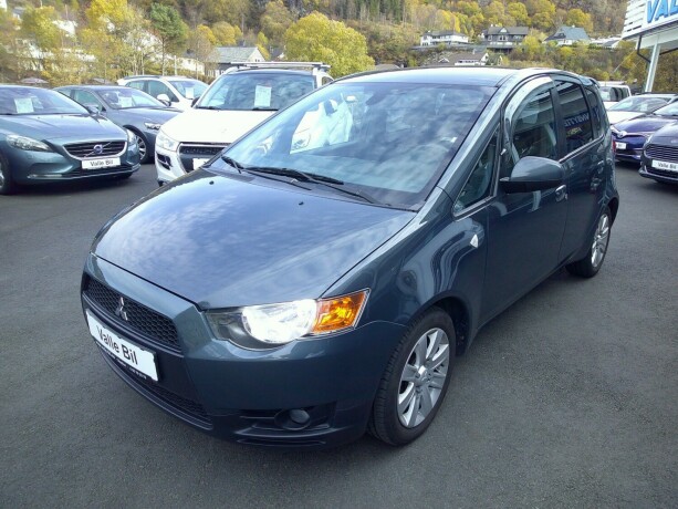 mitsubishi-colt-bensin-2010-big-2