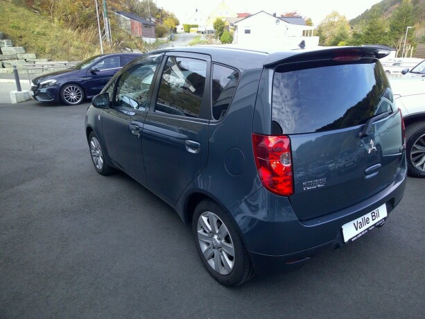 mitsubishi-colt-bensin-2010-big-3