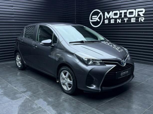 toyota-yaris-elektrisitetbensin-2015-big-0