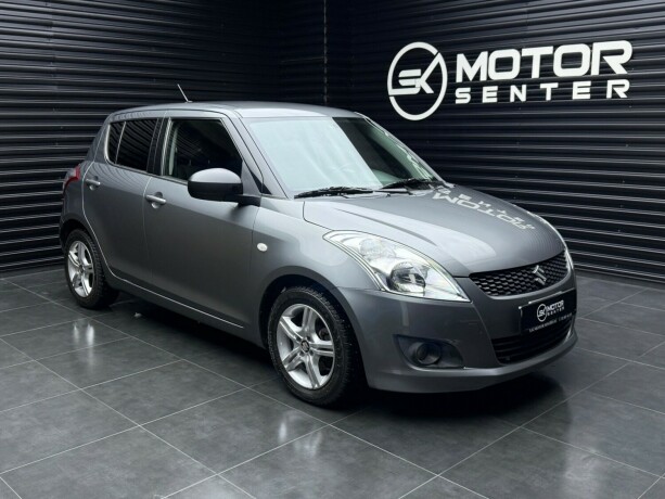 suzuki-swift-bensin-2013-big-0