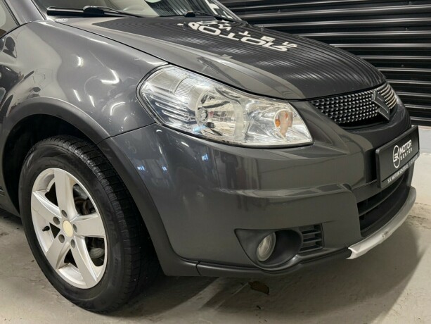 suzuki-sx4-bensin-2011-big-1