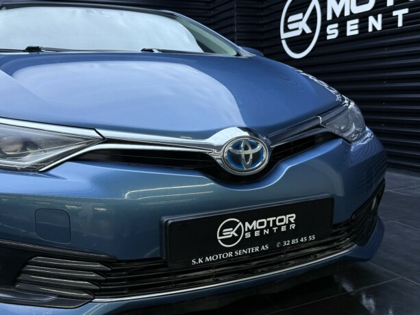 toyota-auris-elektrisitetbensin-2016-big-4