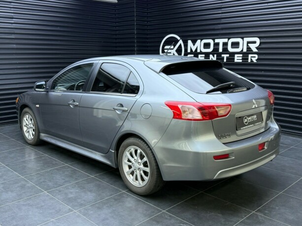 mitsubishi-lancer-bensin-2013-big-1