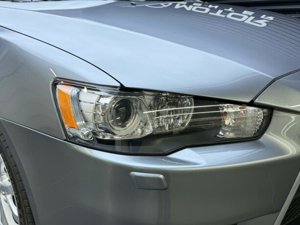 mitsubishi-lancer-bensin-2013-big-3