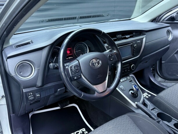 toyota-auris-elektrisitetbensin-2015-big-10