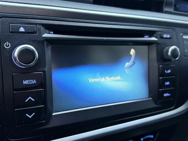 toyota-auris-elektrisitetbensin-2015-big-21