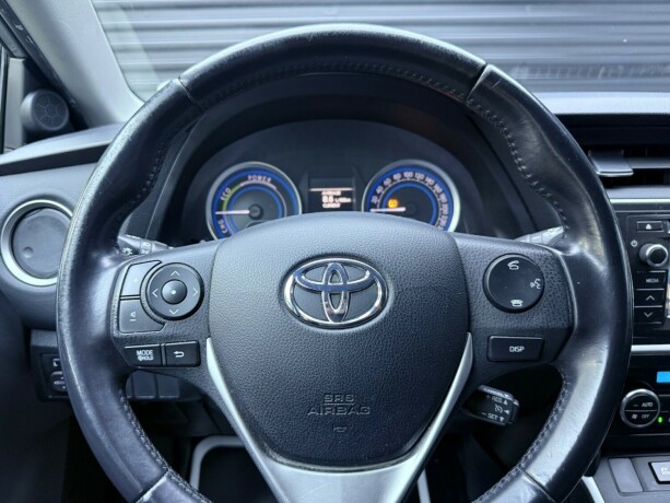 toyota-auris-elektrisitetbensin-2015-big-13
