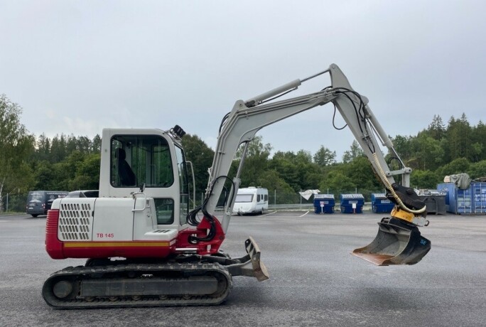 2006-minigraver-gravemaskin-takeuchi-tb145-big-1