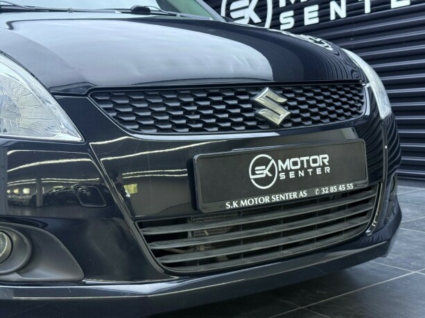 suzuki-swift-bensin-2011-big-4
