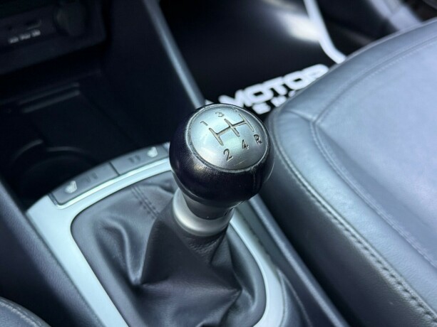 kia-rio-bensin-2013-big-23