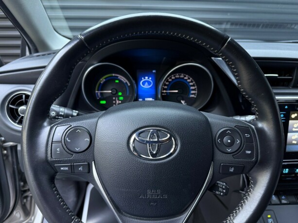 toyota-auris-elektrisitetbensin-2016-big-14
