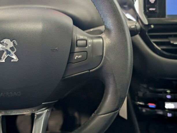 peugeot-208-bensin-2013-big-25