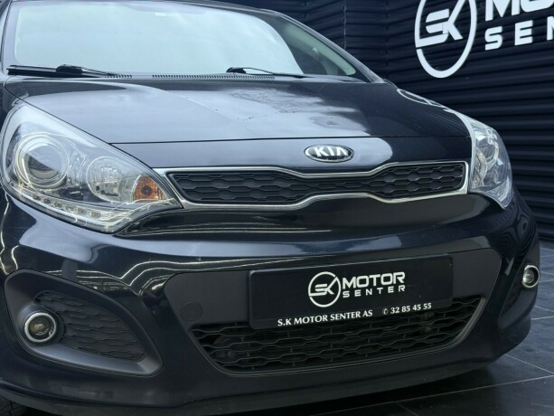 kia-rio-bensin-2013-big-4
