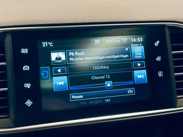 peugeot-308-bensin-2015-big-27