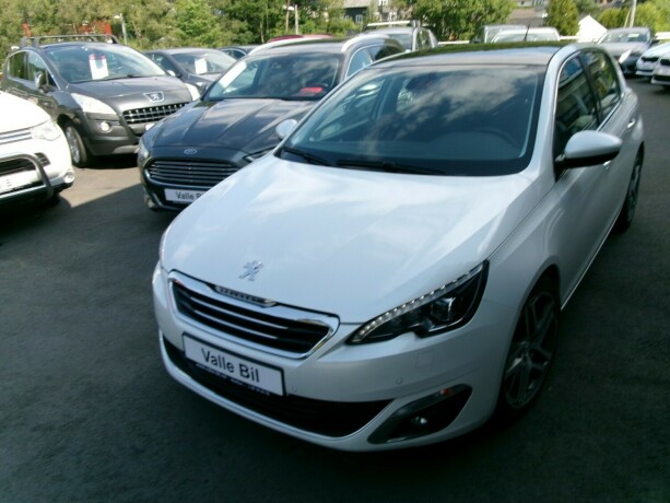 peugeot-308-bensin-2014-big-1