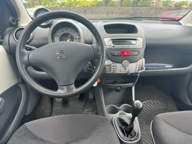peugeot-107-bensin-2011-big-7