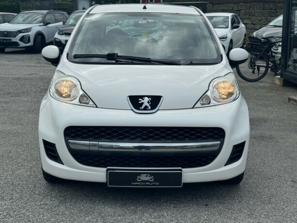 peugeot-107-bensin-2011-big-1