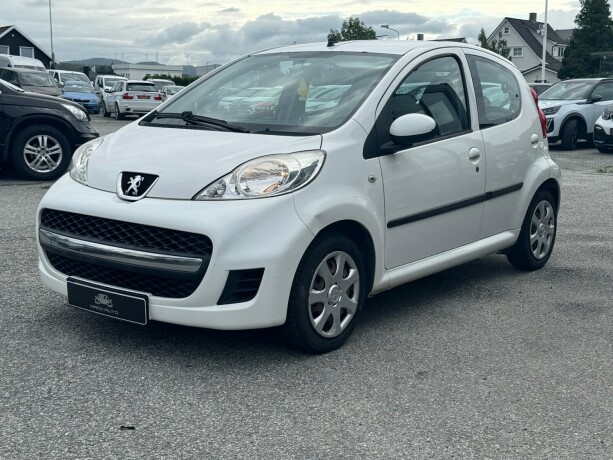 peugeot-107-bensin-2011-big-2