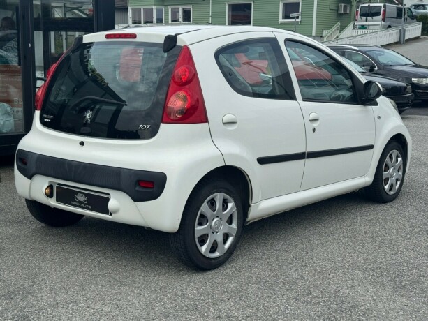peugeot-107-bensin-2011-big-4