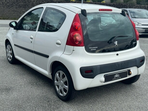 peugeot-107-bensin-2011-big-3