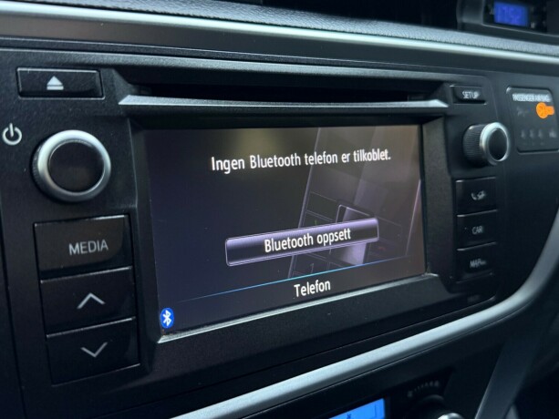 toyota-auris-elektrisitetbensin-2014-big-21