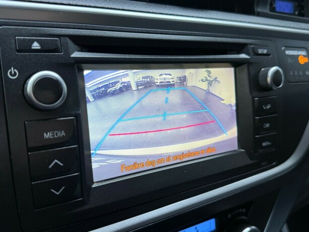 toyota-auris-elektrisitetbensin-2014-big-19