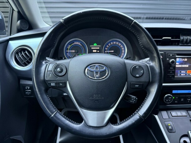 toyota-auris-elektrisitetbensin-2014-big-13