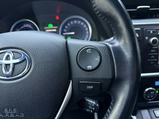 toyota-auris-elektrisitetbensin-2014-big-15
