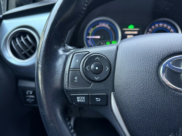 toyota-auris-elektrisitetbensin-2014-big-14