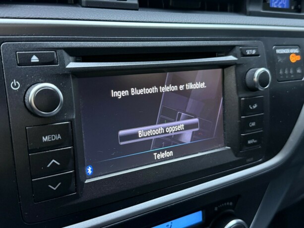 toyota-auris-elektrisitetbensin-2014-big-21