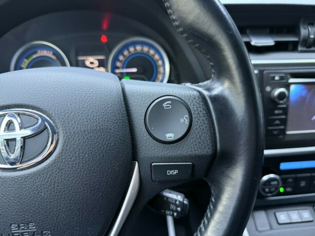 toyota-auris-elektrisitetbensin-2014-big-14