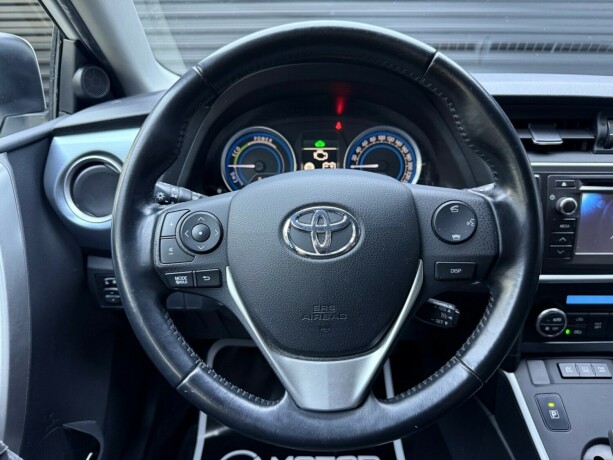 toyota-auris-elektrisitetbensin-2014-big-12